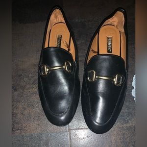 Gently worn black loafer shoes